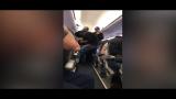 Download Video Lagu Video shows a passenger forcibly dragged off a United Airlines plane Terbaru - zLagu.Net